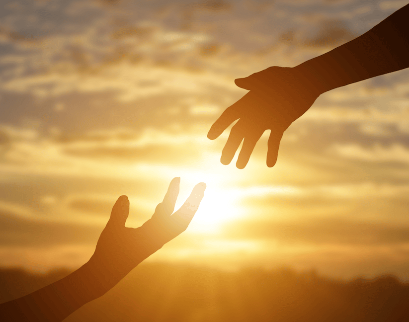 In the background it would either be a sunrise or a sunset. Shadowed in the foreground are two arms one is reaching up from the bottom left up to top right and the other persons hand is reaching down in the opposite direction. Their fingers are almost touching. This represents how we are here to help lift you up and support you towards better health.