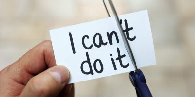 Treatment for chronic pain I can do it resized An image of someone holding a small piece of paper with the words 'I can't do it' written in black. On the right you can see a pair of scissors which is cutting through the ' and t to change the words to I can do it.